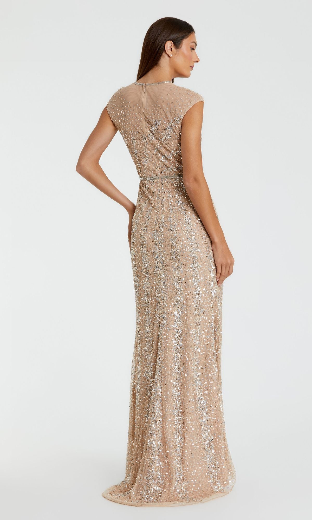 A woman is shown from the back with her hand on her hip, wearing the Mac Duggal 5619 Sleeveless Beaded Long Formal Dress against a plain background.